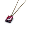 Load image into Gallery viewer, Alice in Wonderland Book Necklace - Literary Lifestyle Company